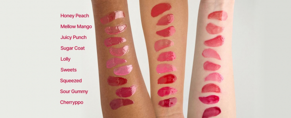 Three arms with different skin tones displaying nine swatches of Fwee Glowy Jelly Pot each
