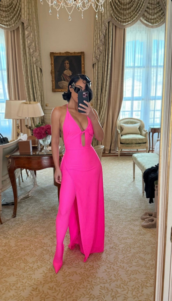 Kim Kardashian wearing a hot pink Balenciaga ensemble
