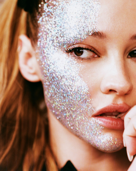 Madelyn Cline with glitter face paint