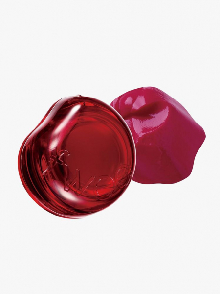 A red jar of Fwee Glowy Jelly Pot in shade Berry Red on a light gray background